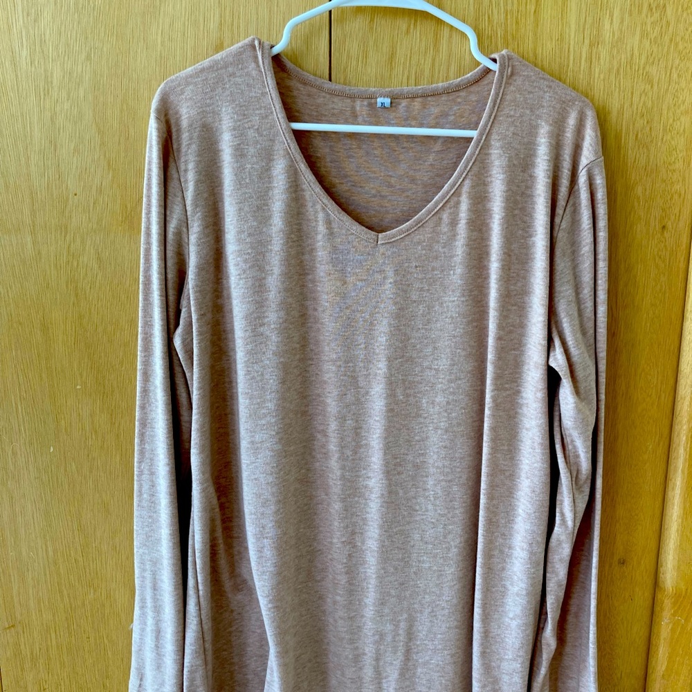 Ready for winter! Size XL. Long sleeve t-shirt.  Color is tan.